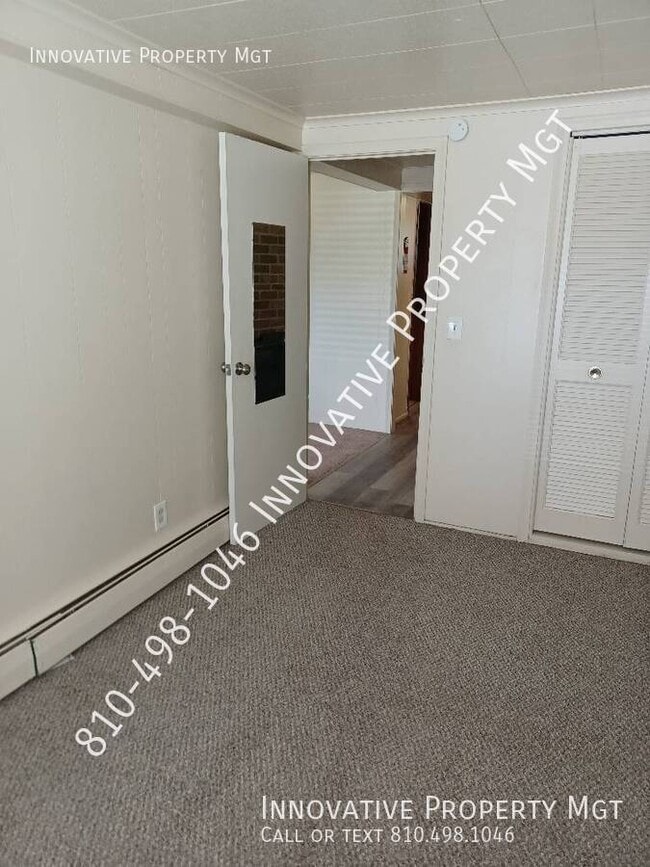 Building Photo - 5181 1/2 N. Elms-#1