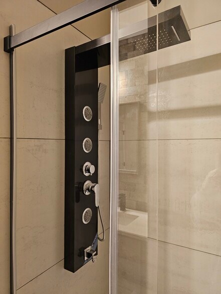 massage jet shower panel - 5827 Broadway St