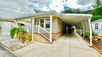 Building Photo - Light, Bright, and Freshly Updated Home in the Gated & Desirable Champagne Village 55+ Community!