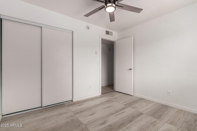 Building Photo - 6038 W Gelding Dr