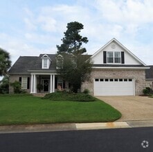 Building Photo - Nicely furnished garage apartment in gated...