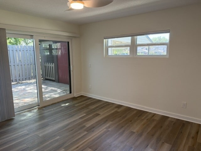 Guest bedroom with private pavered patio - 225 Woods Landing Trl