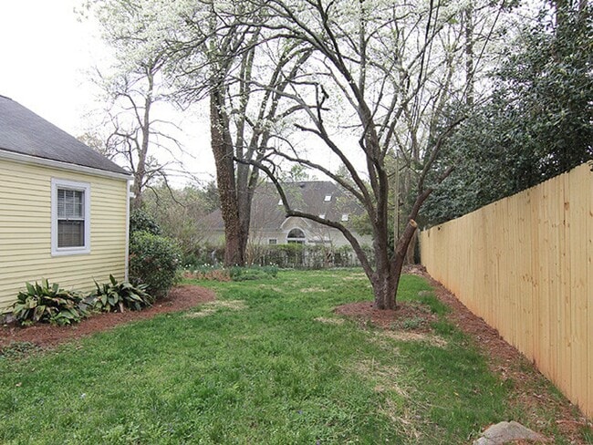 Building Photo - Adorable, Renovated Bungalow with Huge Yar...