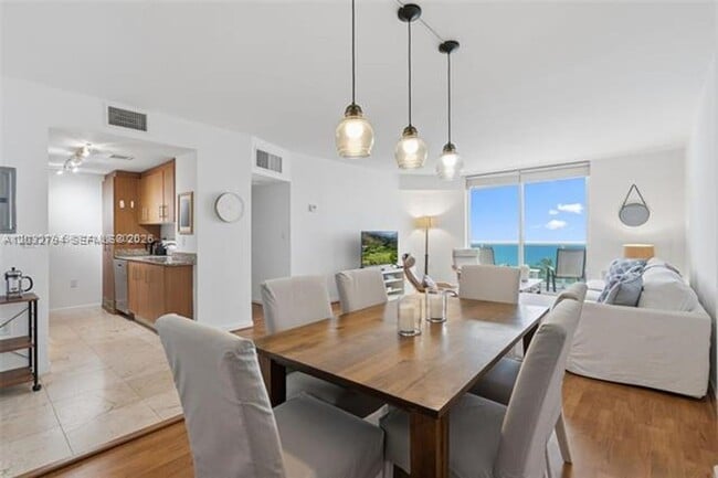 Building Photo - 10275 Collins Ave