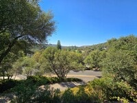 Building Photo - Welcome to this charming 2-bedroom, 1 1/2-...