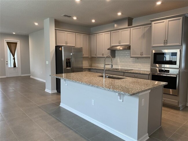 Building Photo - 17704 Passionflower Cir