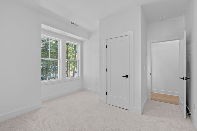 Building Photo - New Construction 4BD, 3.5BA End-Unit Ralei...