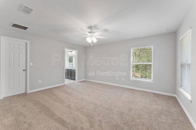 Building Photo - 9461 N Sandree Dr