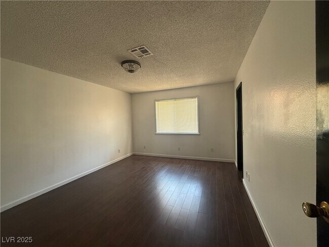 Building Photo - 6661 W Tropicana Ave