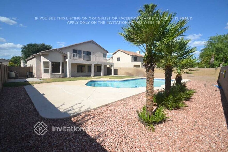 Building Photo - 7447 W Trails Dr