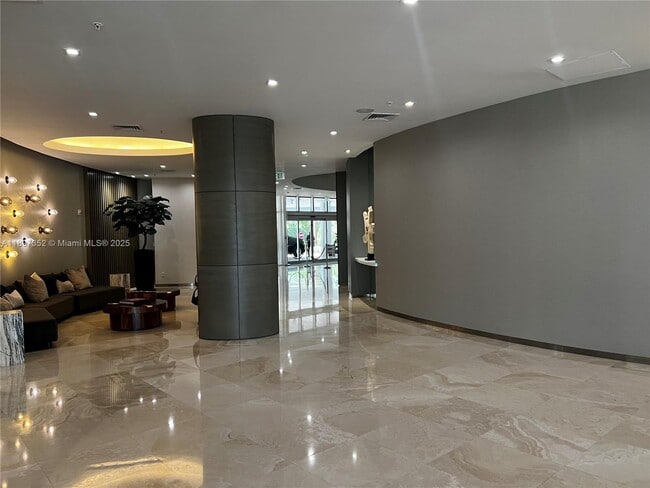 Building Photo - 10275 Collins Ave