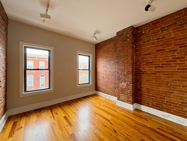 Building Photo - Charming 2 Bedroom/1 Bathroom Townhome with Deck and Parking Pad in South Baltimore!