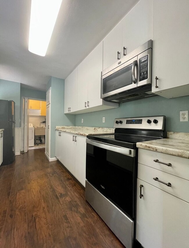 Building Photo - Updated Ranch with Large Fenced Yard, Tucked Off Walker Road~ Gas Fireplace~ Great Natural Light~...