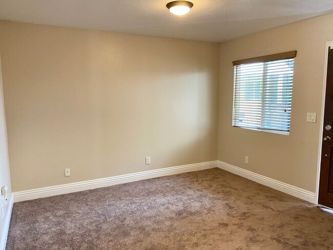 Building Photo - AFFORDABLE 1st Floor Condo & patio yard!