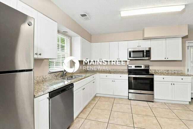 Building Photo - 4 Bedroom Pet-Friendly Home in Acworth, GA with Main Street Renewal