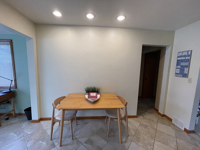 Bright and airy kitchen Danish modern cabinetry - 644 3 Mile Rd NE