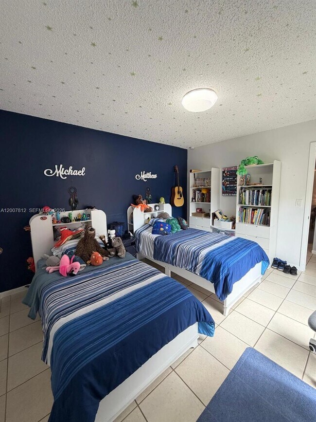 Building Photo - 6580 W 24th Ct