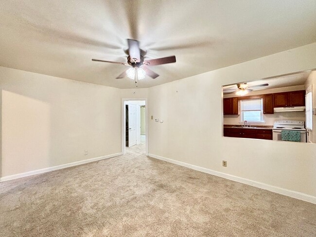 Building Photo - Cozy Home with Private Backyard & Detached...