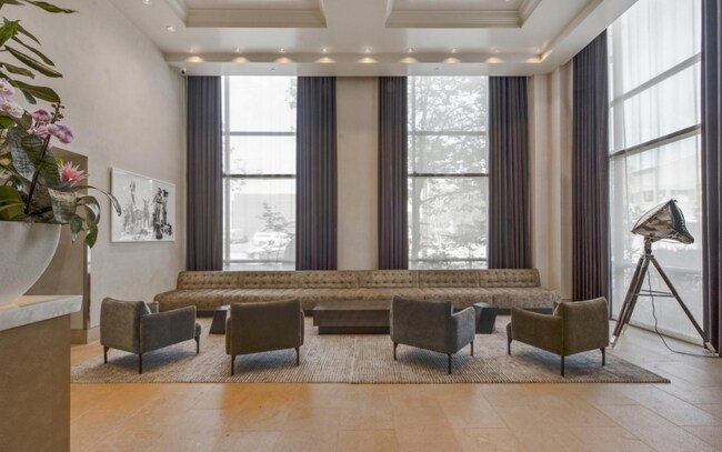 A beautiful lobby with concierge service desk - 311 2nd St