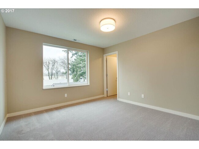 Building Photo - Charming 3BR Home with Fireplace, Bright Open Living Spaces & Loft