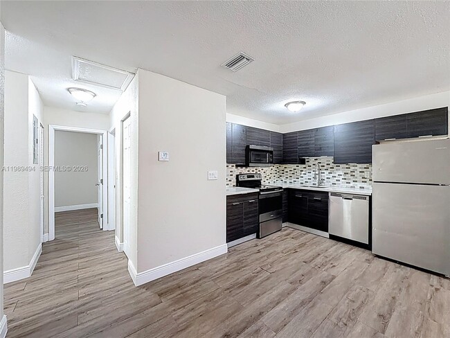 Building Photo - 1800 NW 52nd Ave