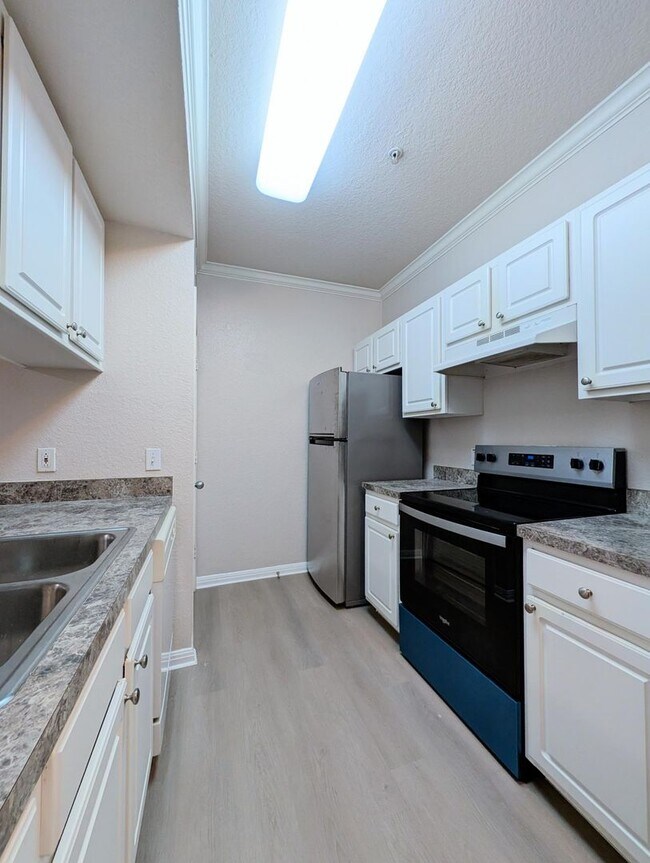 Building Photo - Peaceful, quiet & comfortable! New Vinyl Plank flooring & Appliances
