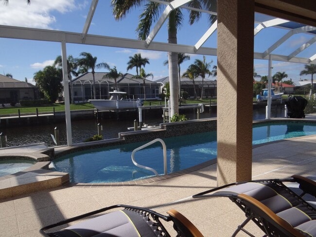 Building Photo - AVAILABLE 2027 SEASON!  TOP OF THE LINE PUNTA GORDA ISLES POOL, SALTWATERFRONT HOME FOR RENT! $74...