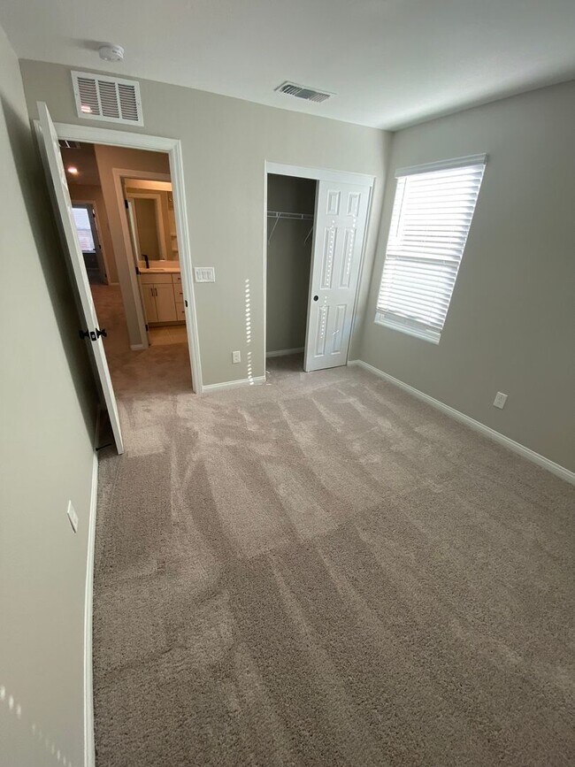 Building Photo - Americana Property Mgmt - 2022 built 4 bedrooms in prime South West Las Vegas