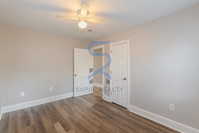 Building Photo - Move in before December 31st and choose your reward: a $250 Amazon Gift Card or a 55" Smart TV!