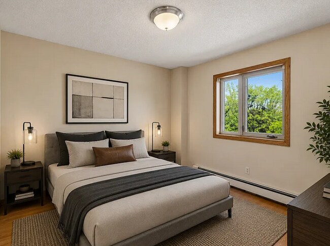 Building Photo - Awesome 2-Bed Condo Retreat in the Heart of Minneapolis  with Skyline views of Downtown