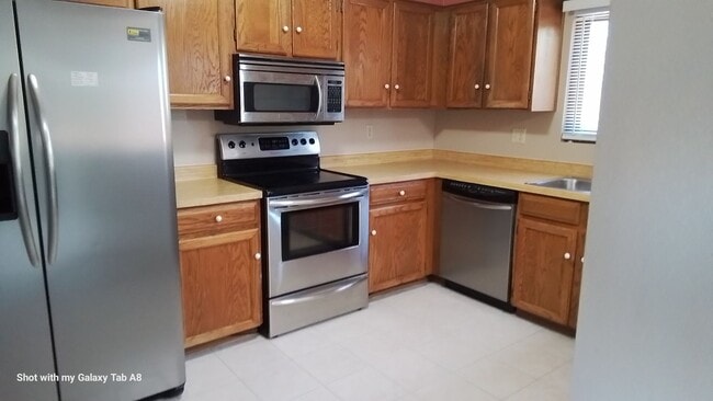 Building Photo - Unfurnished end unit townhome  55 and older community