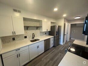 Building Photo - This fully renovated & updated 3 Bedroom a...