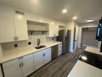 Building Photo - This fully renovated & updated 3 Bedroom a...