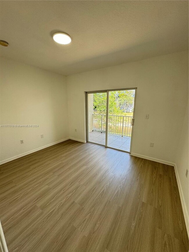 Building Photo - Riverside Drive, Coral Springs, FL 33065 -...