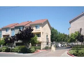 Building Photo - Gated Hayward Townhome with 2-Car Garage & Private Patio