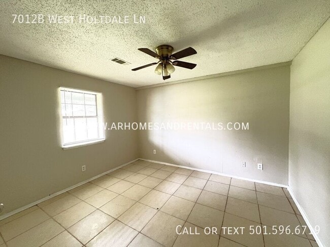 Building Photo - 7012 W Holtdale Ln