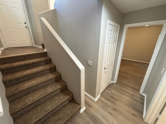 Building Photo - Spacious Tri-Level 4-Bedroom Home with Bal...