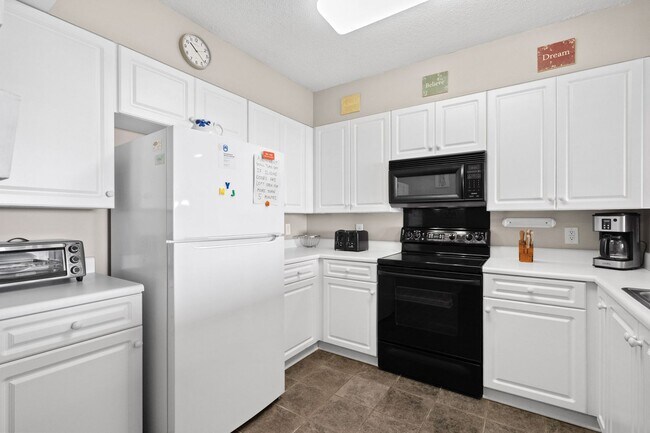 Building Photo - Spacious 3BR/3BA Coastal Retreat at Harbour Pointe – Utilities Included!