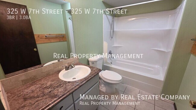 Building Photo - 325 W 7th St