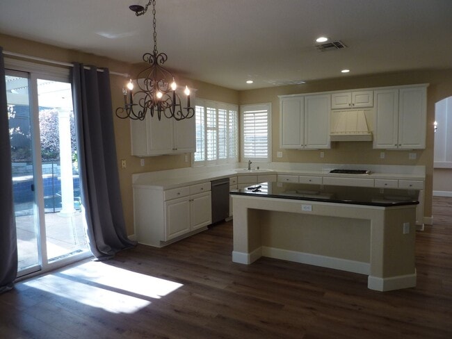 Building Photo - Stunning Single-Family House with a Backyard Oasis in a exclusive Gated Community of Serrano