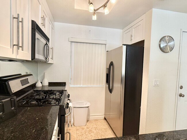 Building Photo - Meridian - Luxury STUDIO Condo w/ laminate Flooring. Pool View in Resort Style Community.