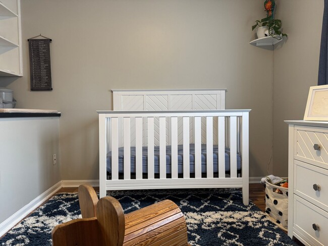 Building Photo - Spacious Corner Townhome with Private Yard...