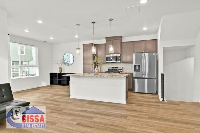 Building Photo - 1.5 year old townhome with 3 bedrooms, 2 1/2 bathrooms, 2-car garage at Victory Ridge available NOW!