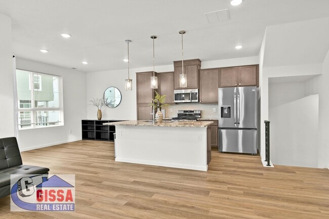 Building Photo - 2 year old townhome with 3 bedrooms, 2 1/2 bathrooms, 2-car garage at Victory Ridge available to ...