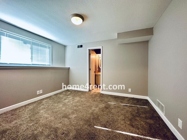 Building Photo - Updated Kitchen, Composite Deck and Refrig...