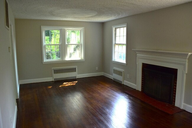 Building Photo - Charming Northside Two-Story Brick Home With 2 car garage and basement