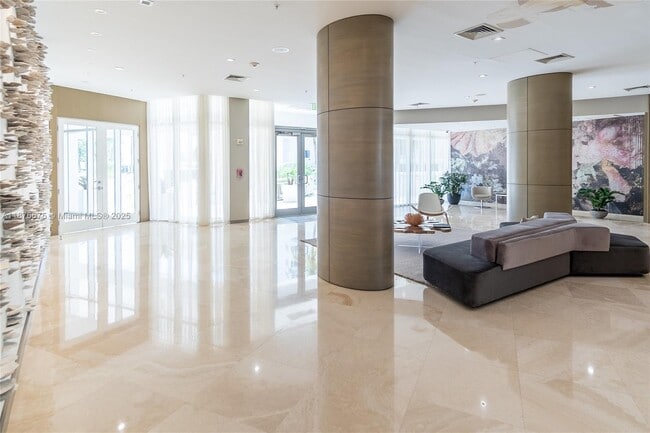 Building Photo - 10275 Collins Ave