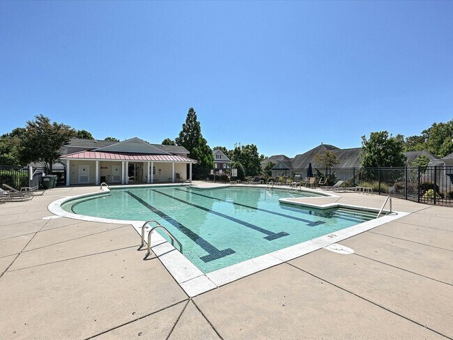 Building Photo - Stylish Condo Living with Open Concept, Garage & Outdoor Space