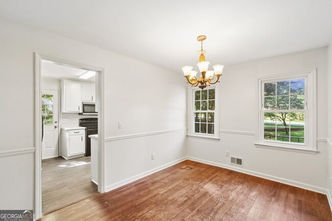 Building Photo - 5659 Whispering Pines Rd
