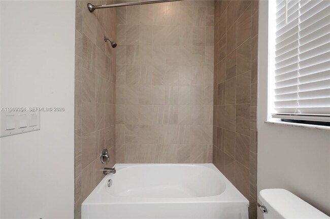 Building Photo - 11815 Leon Cir N